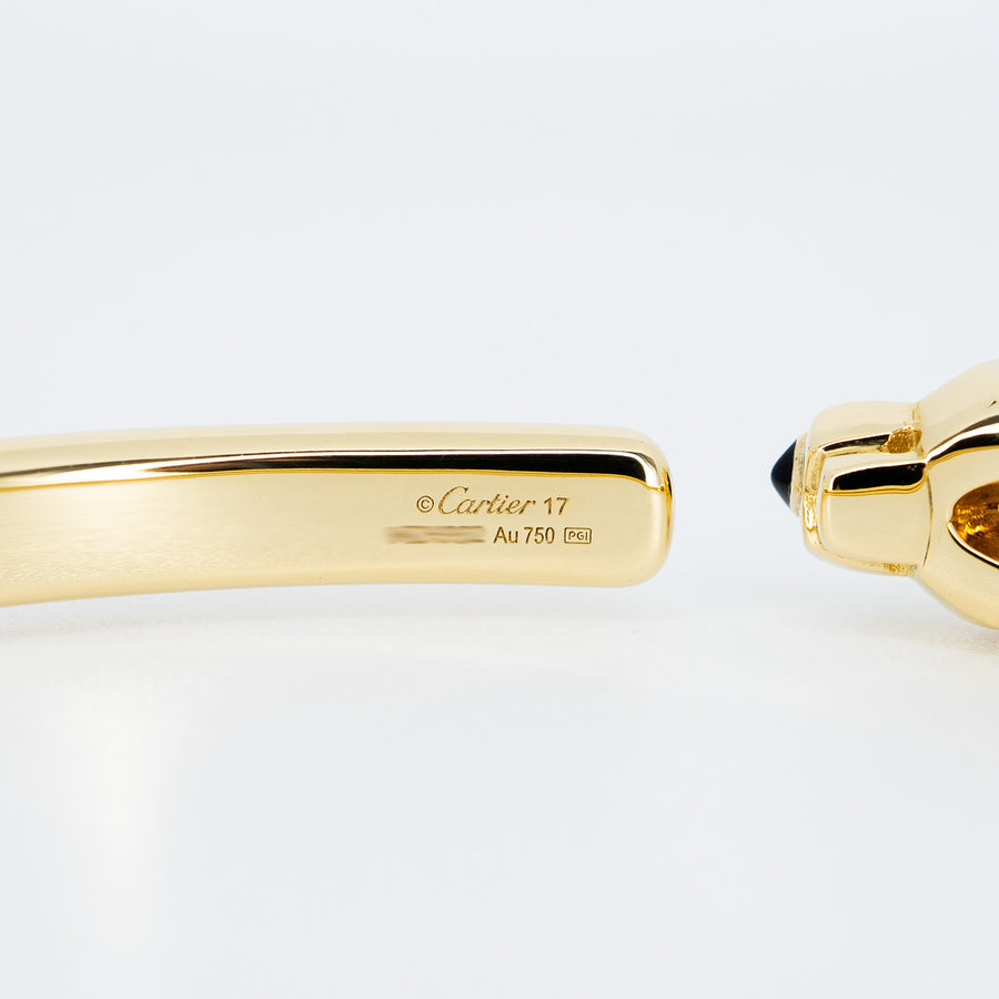 กำไลข้อมือ Cartier Panthere de Cartier bracelet, onyx, set with 2 tsavorite garnets 18K Yellow Gold Size 17# (Used) #vrcab 7303