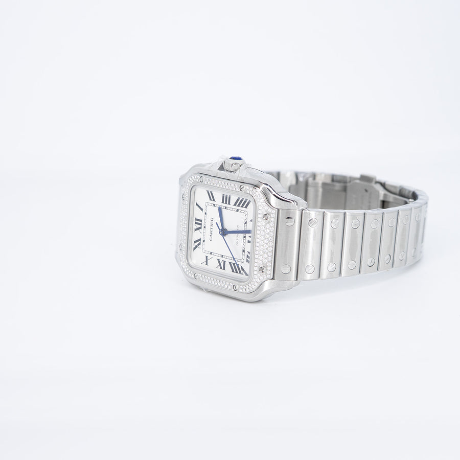 นาฬิกา Cartier Santos watch, medium model, mechanical movement with automatic winding, caliber 1847 MC. Steel case, steel bezel set with 206 brilliant-cut diamonds totaling 0.64 carats Stainless Steel Size M# (Used) #vrca 0957