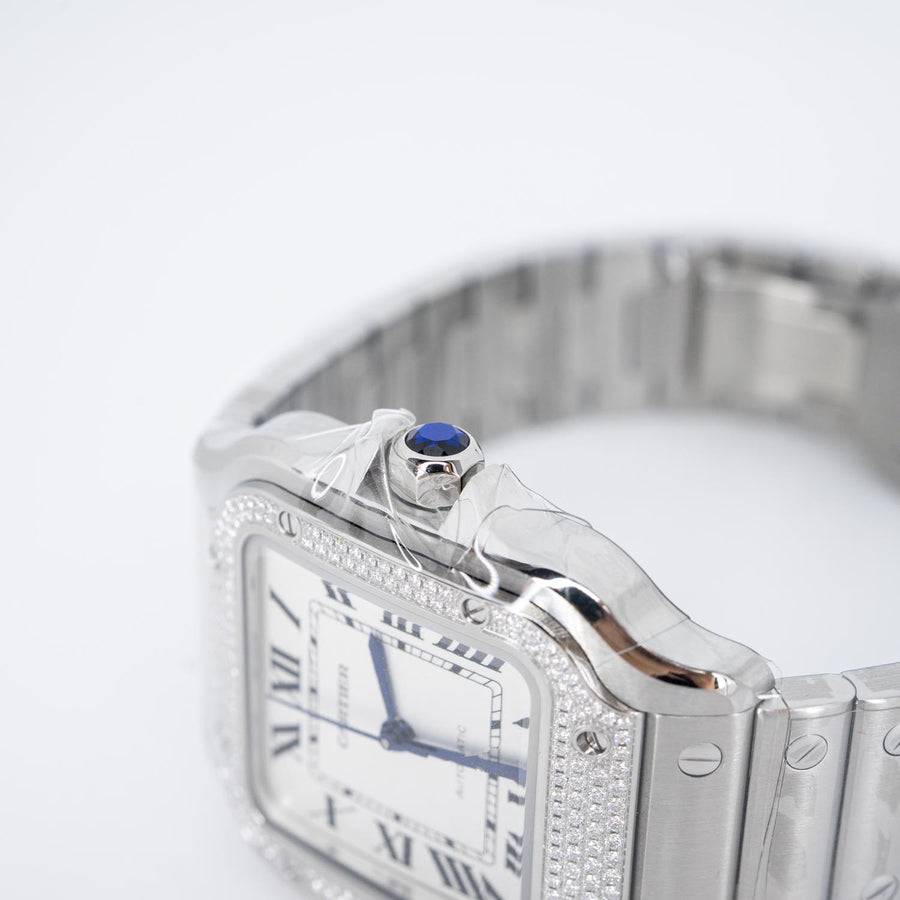 นาฬิกา Cartier Santos watch, medium model, mechanical movement with automatic winding, caliber 1847 MC. Steel case, steel bezel set with 206 brilliant-cut diamonds totaling 0.64 carats Stainless Steel Size M# (Used) #vrca 0957