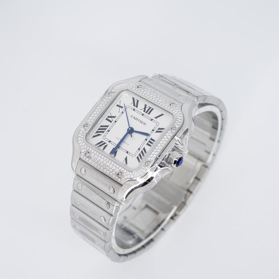 นาฬิกา Cartier Santos watch, medium model, mechanical movement with automatic winding, caliber 1847 MC. Steel case, steel bezel set with 206 brilliant-cut diamonds totaling 0.64 carats Stainless Steel Size M# (Used) #vrca 0957
