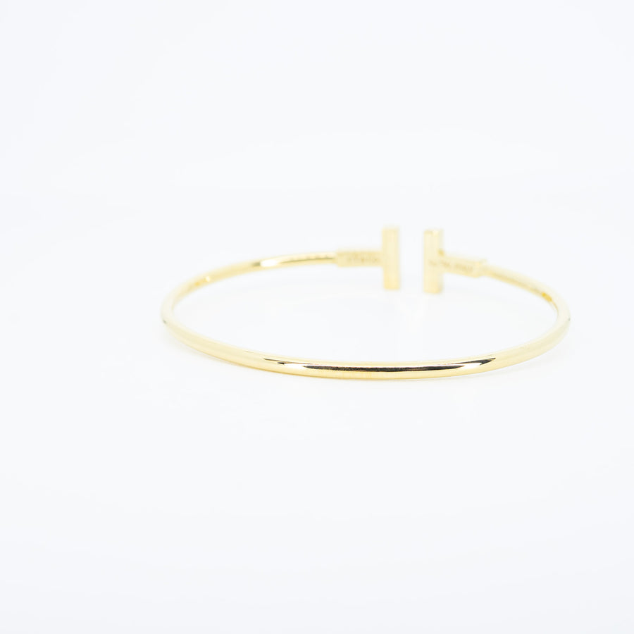 **Hold k.Bhanu Patr Bunnag** กำไลข้อมือ Tiffany & Co. Tiffany T Wire Bracelet, Mother-of-pearl 18K Yellow Gold Size M# (Used) #vrtib 7510
