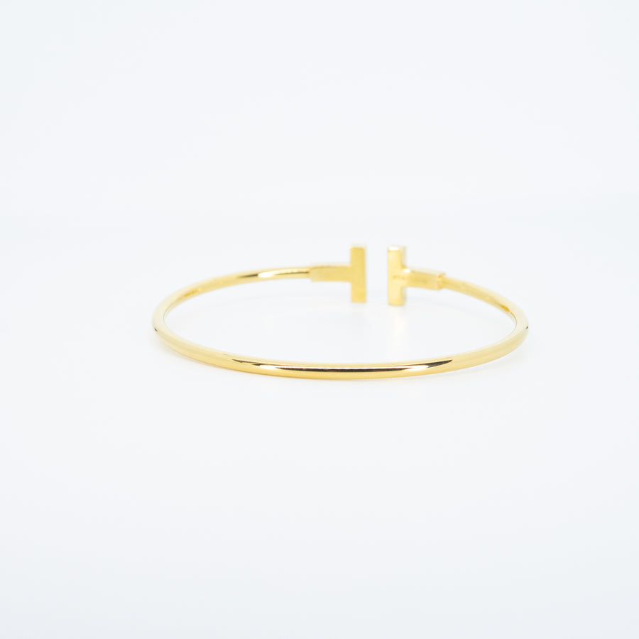 กำไลข้อมือ Tiffany & Co. Tiffany T Wire with Diamond Bracelet 18K Yellow Gold Size M(16 cm.)# (Used) #vrti 1045